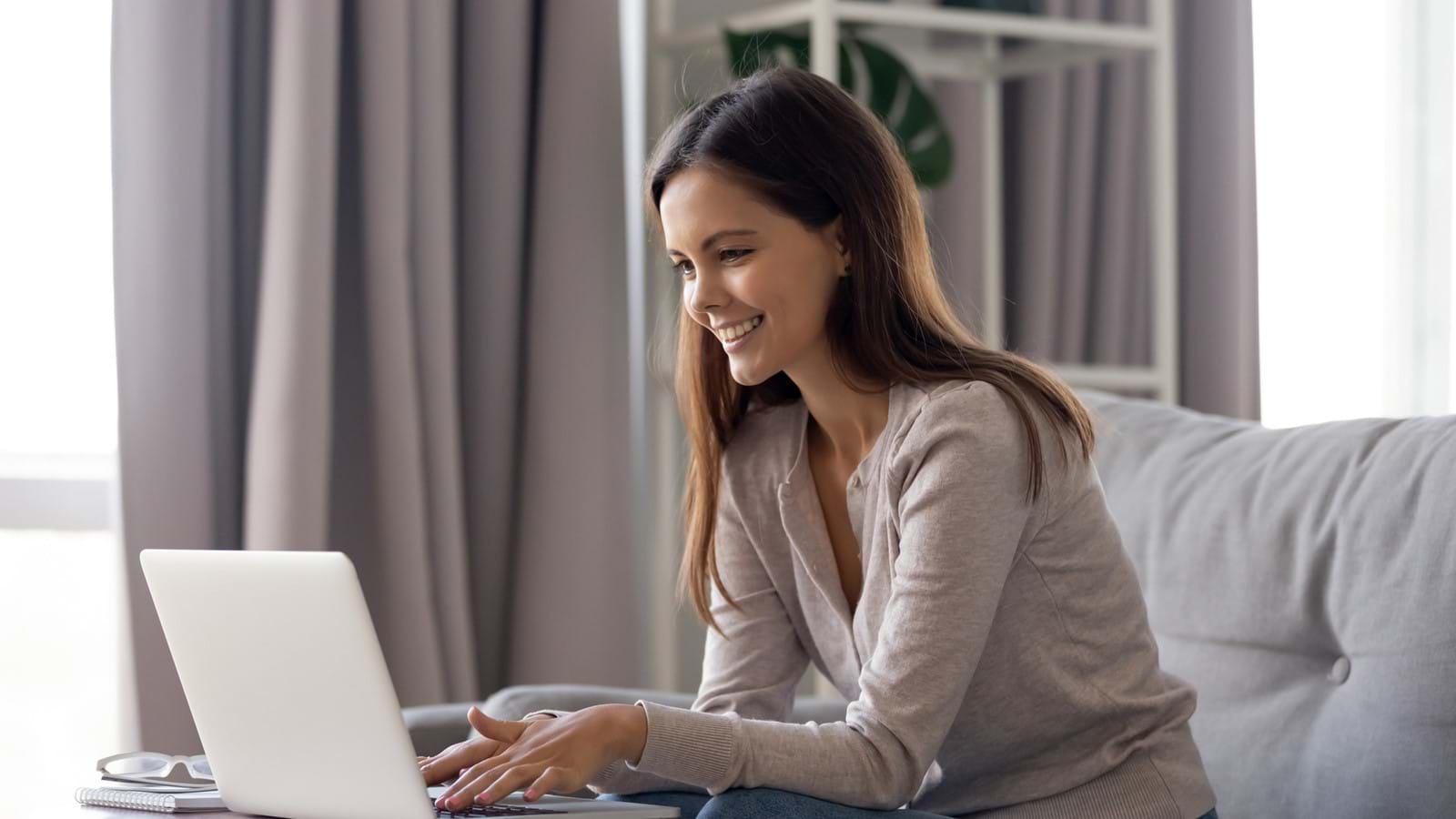 Woman working from home on her company Intranet