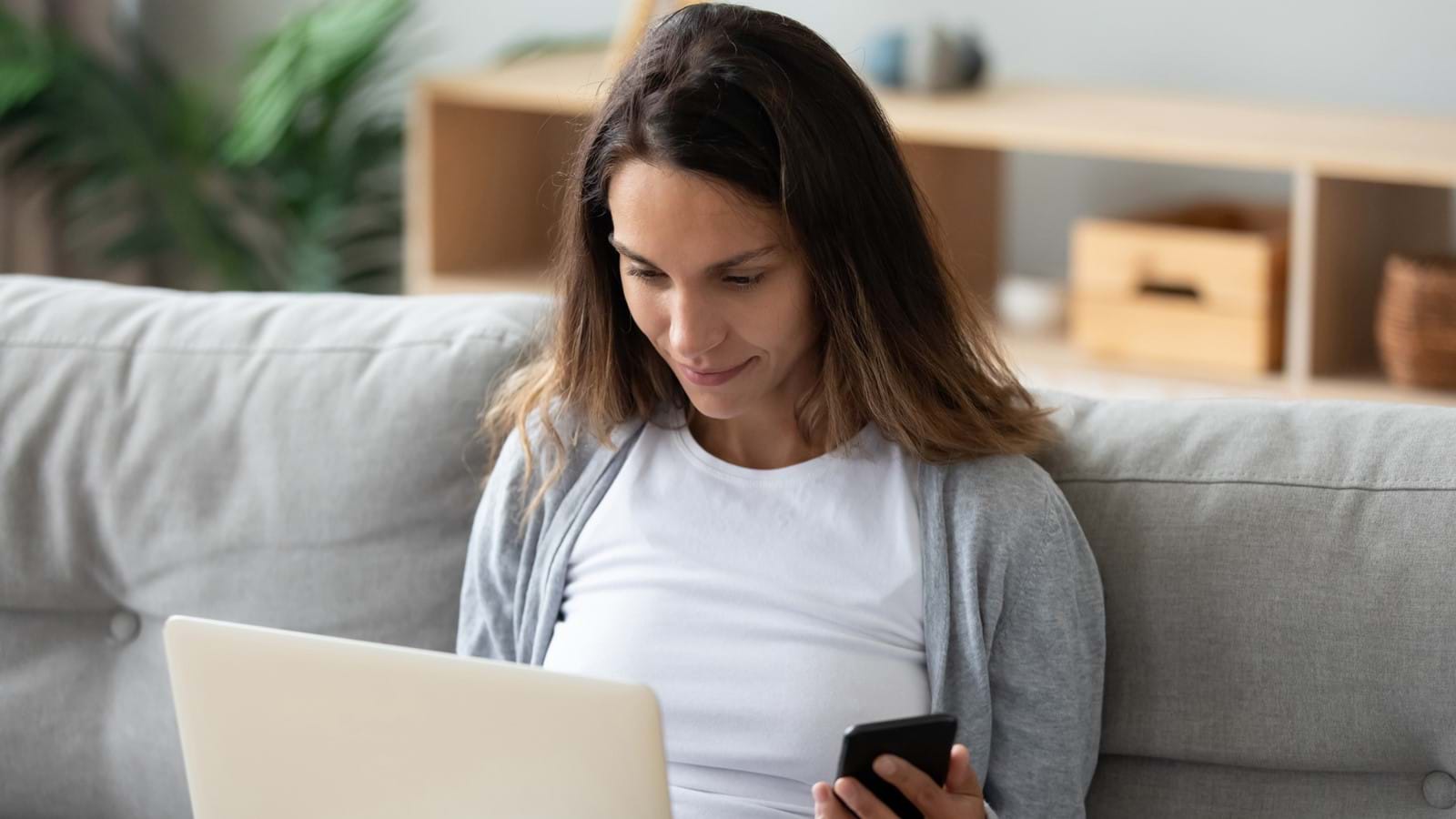 Woman working from home on her company intranet