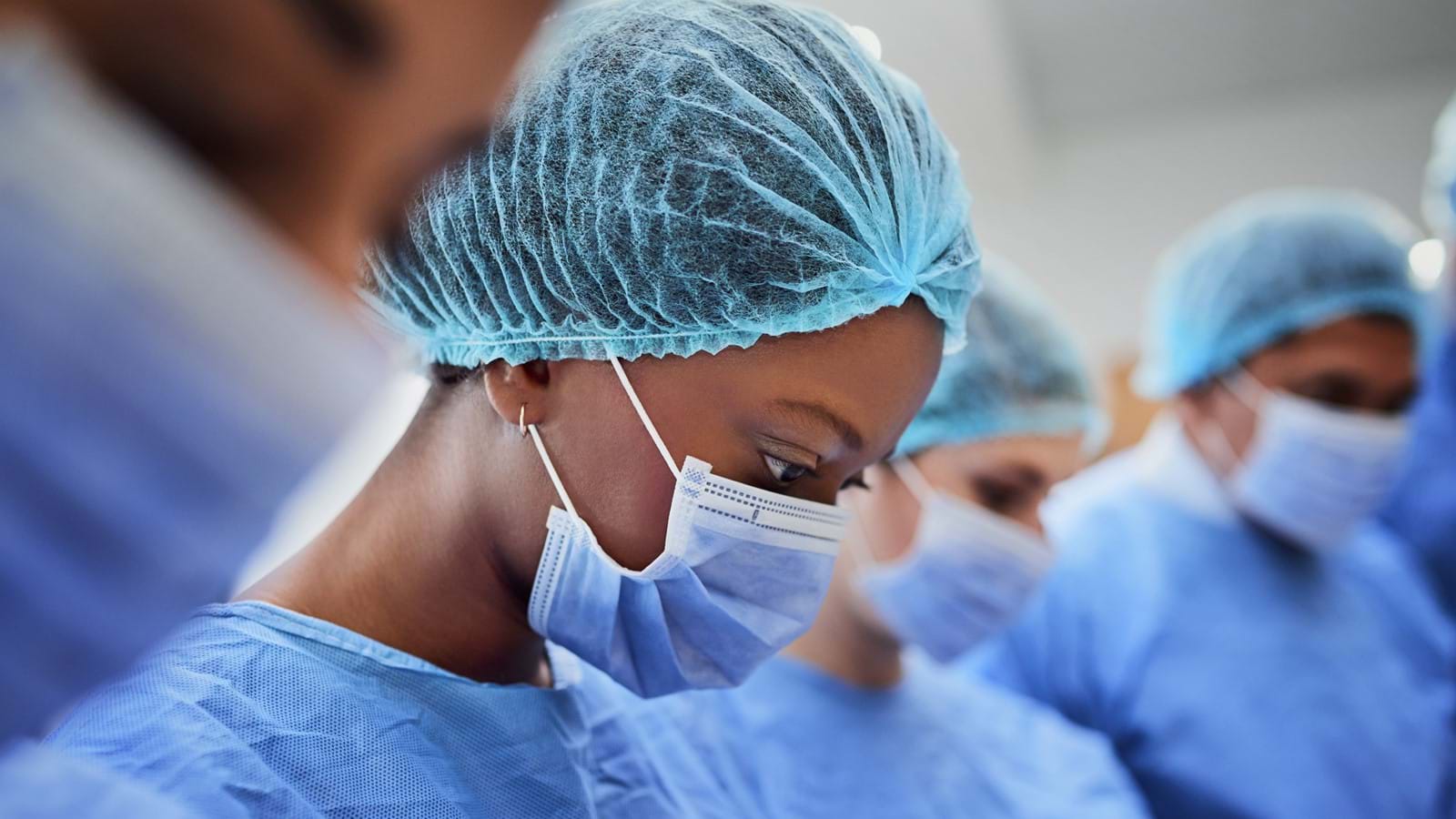 Healthcare surgeons in an operating theater