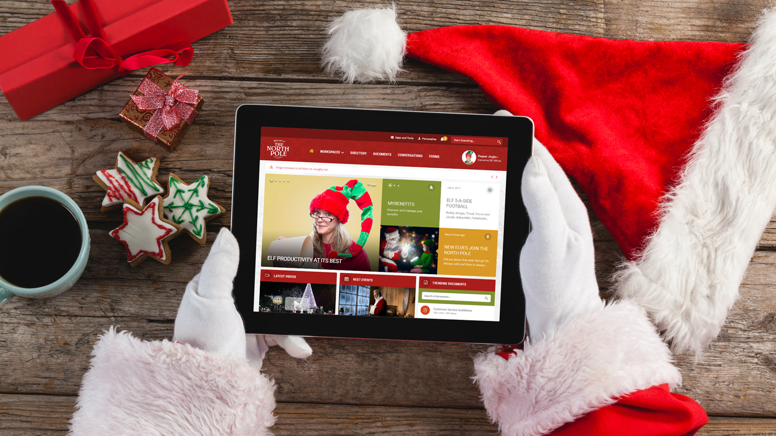 Santa Clause accessing the The North Pole, a Unily intranet on a tablet device 